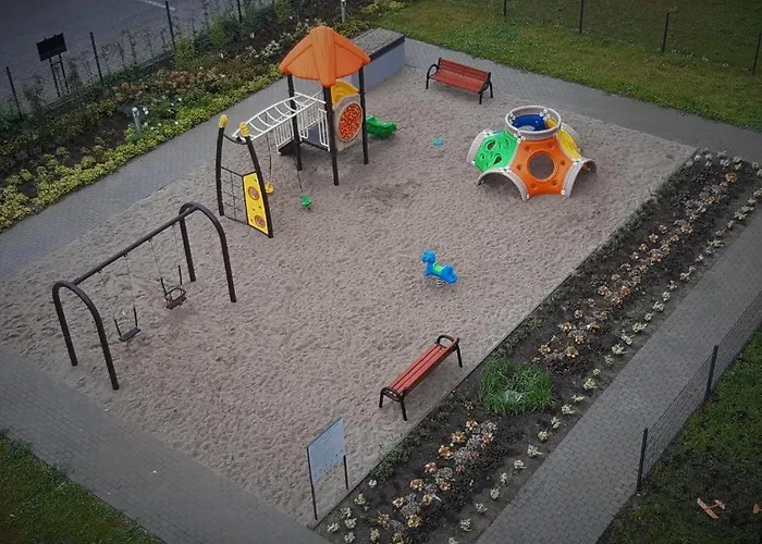 Apartament Kapitalny przy porcie w Kołobrzegu z rowerownią i placem zabaw